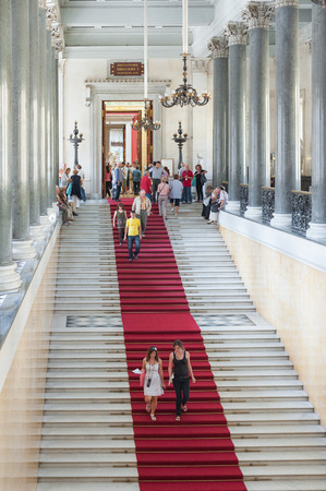 ST. PETERSBURG - JUNE 30, 2011: Unidentified tourists go down a staircase at the Hermitage. Over 3 million people visit the museum every year.のeditorial素材