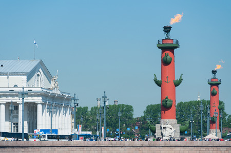 ST. PETERSBURG - MAY 31, 2011: A view at Rostrum columns and the Old Saint Petersburg Stock Exchange. They are situated at the Spit of Vasilyevsky Island.のeditorial素材