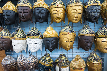 various Thai Buddhist masks as souvenirs for saleの写真素材