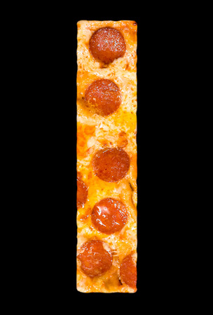letter I cut out of pizza with peperoni and cheese, isolatedの写真素材