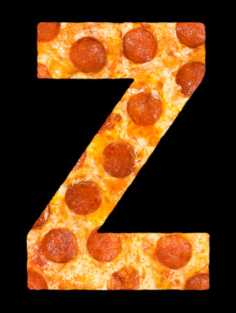 letter Z cut out of pizza with peperoni and cheese, isolatedの写真素材