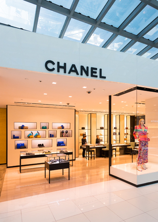 BANGKOK - DECEMBER 17, 2015: A boutique of Chanel in duty free area of the International Airport Suvarnabhumi. Chanel S.A. is a high fashion house founded in in Paris, 1909.のeditorial素材