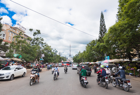 DA LAT, VIETNAM - AUGUST 6, 2016: Motobikers drive along Nguyen Thi Minh Khai Street in the city center. In Vietnam, Da Lat is a popular tourist destination.のeditorial素材