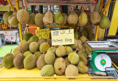 KUALA LUMPUR - MARCH 13, 2017: A lot of durians for sale in Jalan Alor Street famous with budget restaurants of various cuisines of the world.のeditorial素材