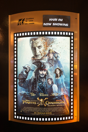 KUALA LUMPUR - JUNE 16, 2017: A poster of Pirates of the Caribbean Salazars Revenge in Pavilion movie theater. It was released on May 26 2017 and has become the fourth highest grossing film of 2017のeditorial素材