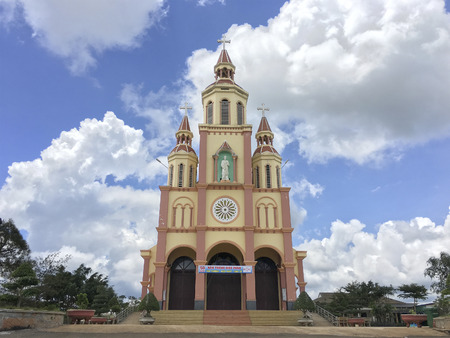 DAK SONG, VIETNAM - JULY 1, 2017: The facade of Hoa An catholic church. Vietnam has the fifth largest Catholic population in Asia.のeditorial素材