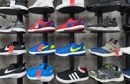 KUALA LUMPUR - MARCH 13, 2017: Footwear of various brands in the Royal Sporting House store in Plaza Low Yat. The mall is located in Bukit Bintang the shopping and entertainment district in the city.のeditorial素材