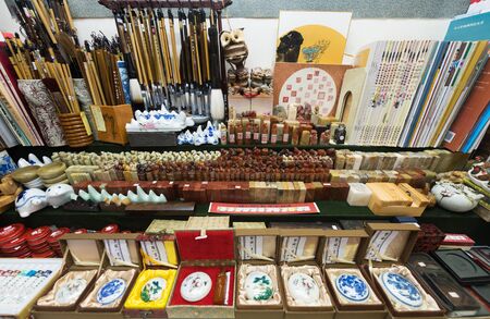 KUALA LUMPUR - SEPTEMBER 12, 2017: A calligraphy store with a range of penman goods at the Central Market. It was founded in 1888 and originally used as a wet marketのeditorial素材
