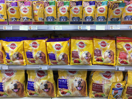 SIEM REAP, CAMBODIA - APRIL 28, 2020: Various Pedigree products for sale at a local supermarket. Pedigree Petfoods is a subsidiary of the American group Mars, Incorporated specializing in pet food.のeditorial素材