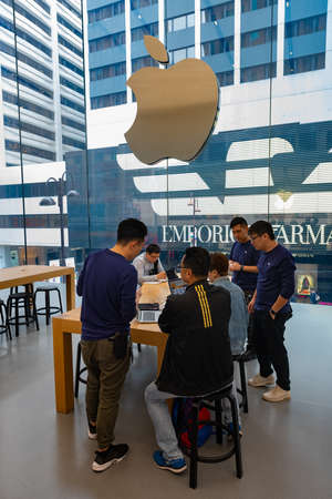 HONG KONG, CHINA - MARCH 16, 2017: People inside the Apple Store at Genius Bar. As of 2014, Apple employs 72,800 permanent full time employees, maintains 437 retail stores in fifteen countries.のeditorial素材