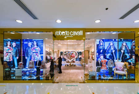 HONG KONG - MARCH 16, 2017: A Roberto Cavalli Junior store of childrens clothing in the Ocean Terminal, Harbor City. Ocean Terminal is a cruise terminal and shopping center located on Canton Road.のeditorial素材