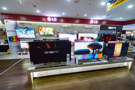 KUALA LUMPUR - MARCH 14, 2017: LG OLED TV screens in Low Yat Plaza. LG Corporation is a South Korean multinational conglomerate corporation being the fourth largest one in South Korea.のeditorial素材