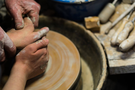 Communic pagan four hands on a pom putterのeditorial素材