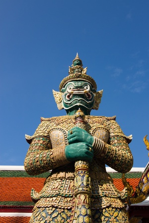 the giant statue in wat phra kaew (temple of the emerald buddha), bangkok thailand. の写真素材