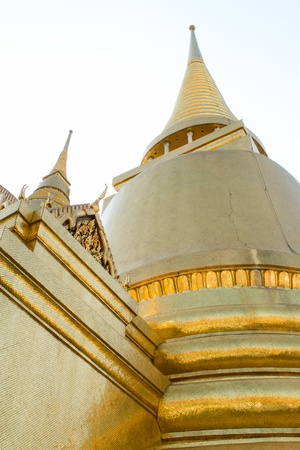 the gold pagoda in wat phra kaew grand palace bangkok, thailandの写真素材