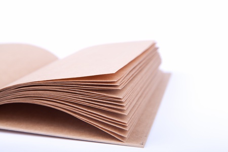 Notebook made from recycled paper on white backgroundの写真素材