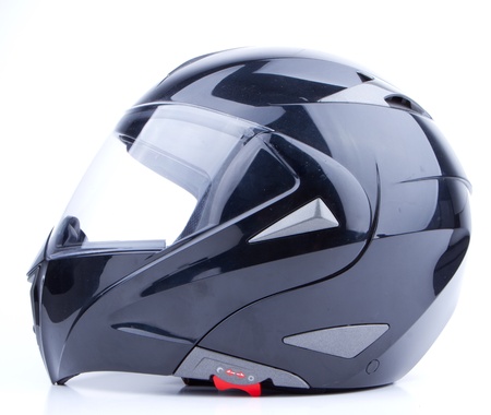 Black, shiny motorcycle helmet Isolated on white background Black, shiny motorcycle helmet Isolated on white background