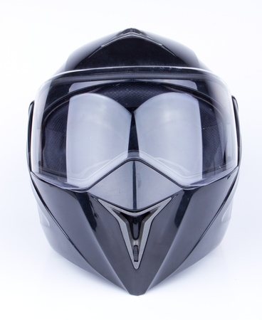 Black, shiny motorcycle helmet Isolated on white backgroundの写真素材