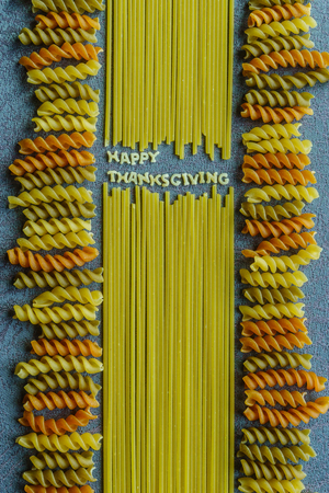 Happy Thanksgiving message arranged using pastaの写真素材