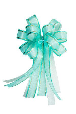 Bow made from gold-trimmed cyan ribbon and grey ribbon isolated on whiteの写真素材