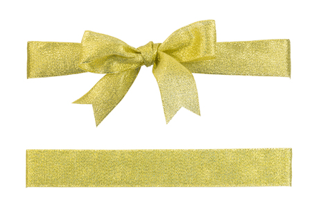 Golden twinkle ribbon bow and strip isolated on whiteの写真素材