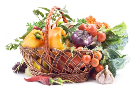 Basket with vegetables on white backgroundの写真素材