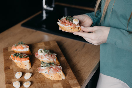 Bruschetta with salmon fillet and jamon. Delicious Italian bruschetta antipastiの写真素材