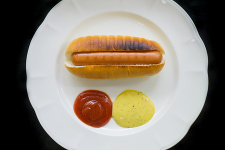 Hot dog with ketchup and mustardの写真素材