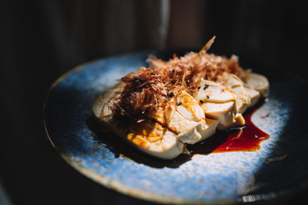 Tofu steak on blue plateの写真素材