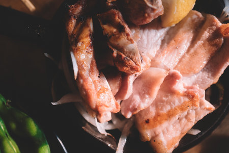 Pork chop in hot plate top view, close up shotの写真素材