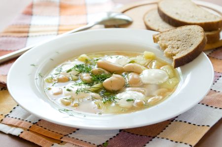 White bean and potato  soup with sour creamの写真素材