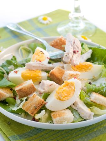 A grilled chicken caesar salad with crunchy croutons. Healthy and delicious! の写真素材