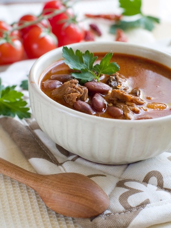 A bowl of homemade chili kidney bean soup with meat の写真素材