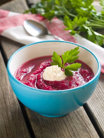 Beet cream soup with garlic and sour cream, selective focusの写真素材