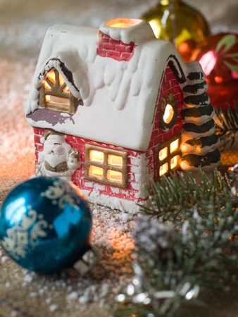 Christmas candle house with light, selective focus の写真素材