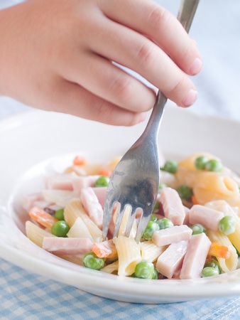 Fresh pasta with vegetables and ham  for baby. Shot for a story on homemade, organic, healthy baby foods.の写真素材