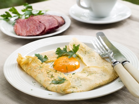 Pancake with egg and bacon, selective focusの写真素材