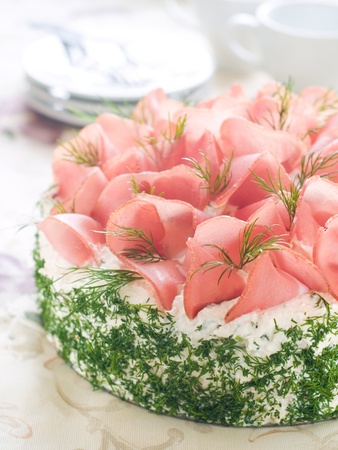 Sandwich cake with prosciutto and dill for appetizer, selective focusの写真素材