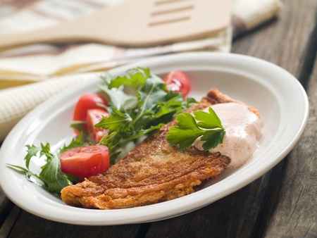 Egg omelette with tomato and arugula salad for breakfast, selective focusの写真素材