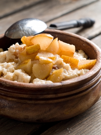 Oat porridge with caramelized fruit, selective focusの写真素材