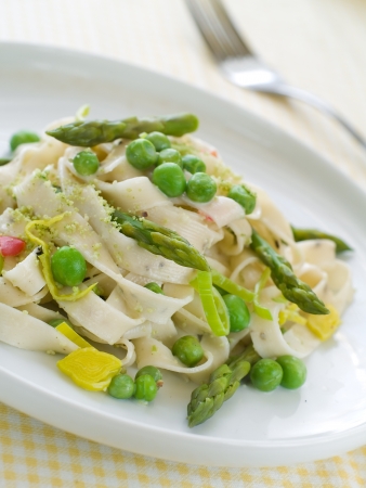 Pasta with asparagus and peas, selective focusの写真素材