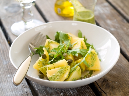 Potato salad with pesto and arugula, selective focus の写真素材