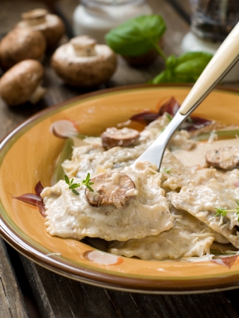 Ravioli with mushroom sauce and cheese, selective focusの写真素材