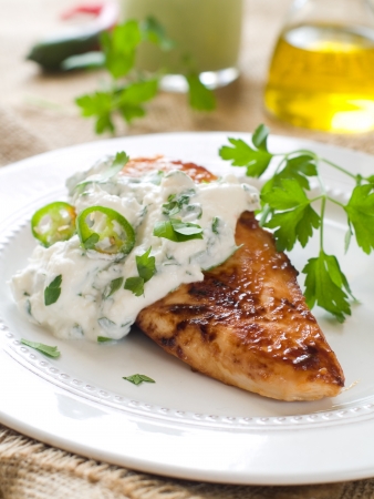 Grilled chicken breast with sauce, selective focusの写真素材