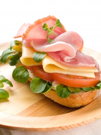Sandwich with ham, tomato and corn, selective focus の写真素材