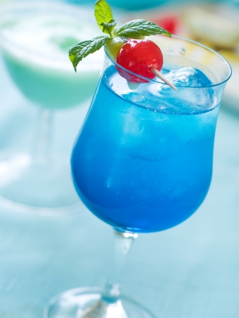 Blue cocktail with ice, selective focusの写真素材