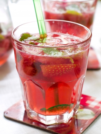 Fresh strawberry mojito or lemonade with mint, selective focusの写真素材
