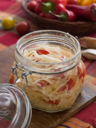 Marinated cabbage (sauerkraut) in glass jar, selective focusの写真素材