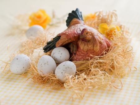 Chicken with chocolate Easter eggs, selective focusの写真素材
