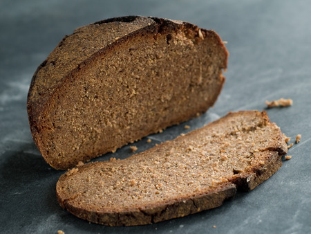 Rye bread on an old background, selective focus
